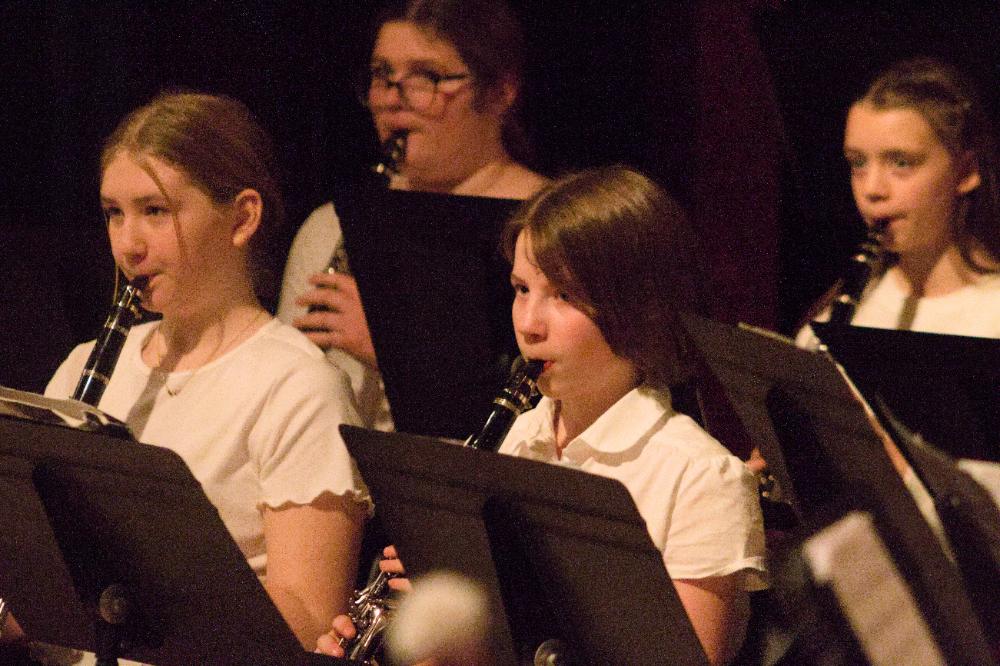 Clarinet students playing in band